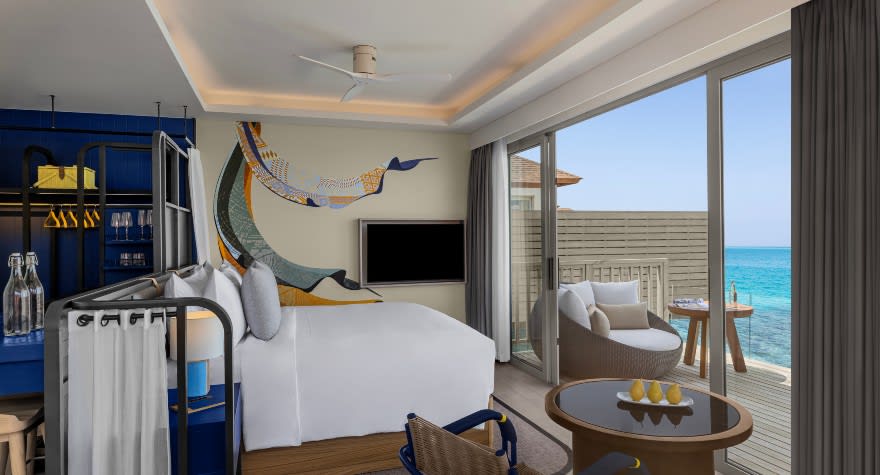 Avani Over Water Villa Bedroom at Avani+ Fares Maldives Resort