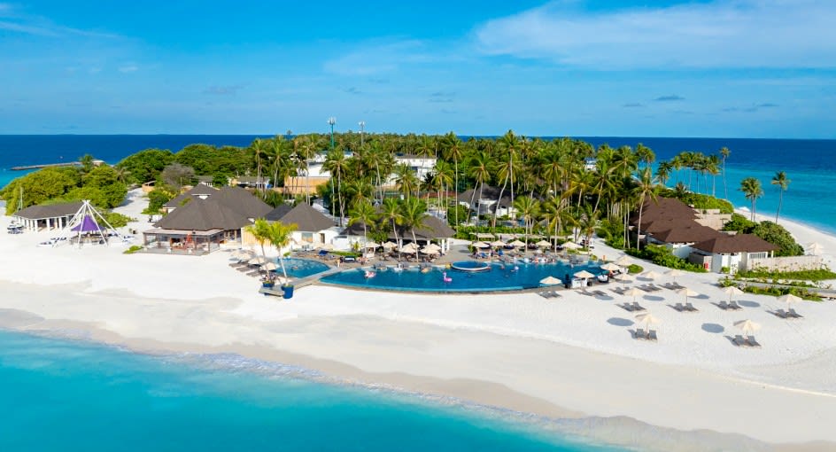 Aerial view of Avan+ Fares Maldives Resort by day