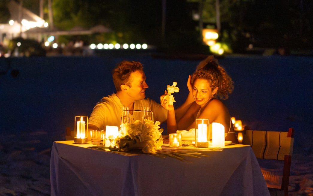 Romantic dinner on the beach at Avani+ Fares Maldives Resort
