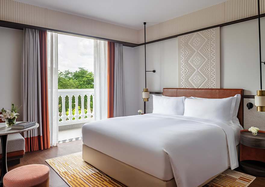 avani lanexang vientiane bedroom deluxe room balcony