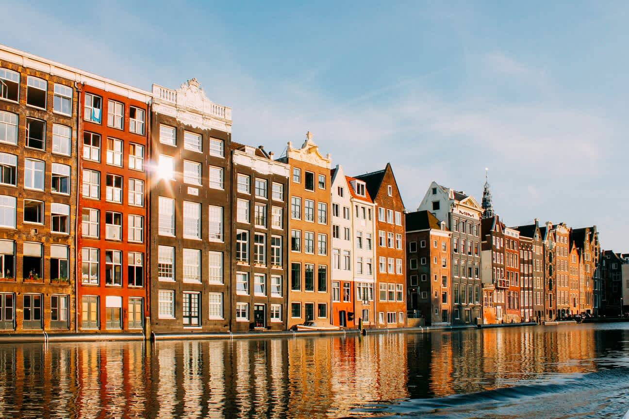 Canals and historic Dutch Baroque houses by the water in Amsterdam