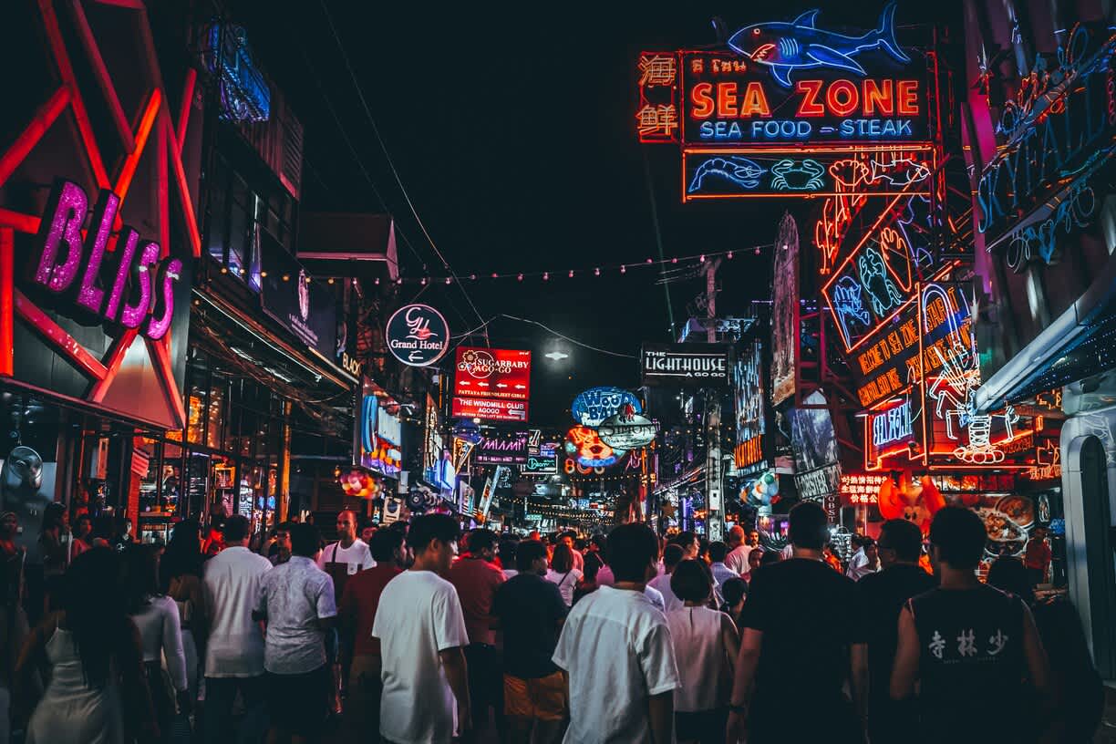 Pattaya street at night with neon lights