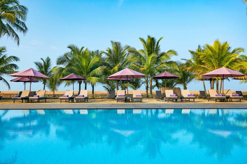 Relax and soak up the sun by the pristine beach and sparkling swimming pool in Mozambique