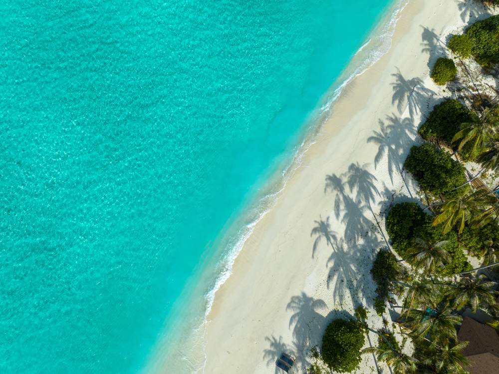 Aerial view of the beach in Fares, part of the Baa Atoll UNESCO biosphere in Maldives 