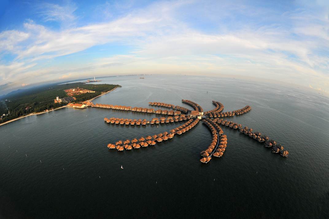 Aerial view of Avani Sepang Goldcoast Resort on the water