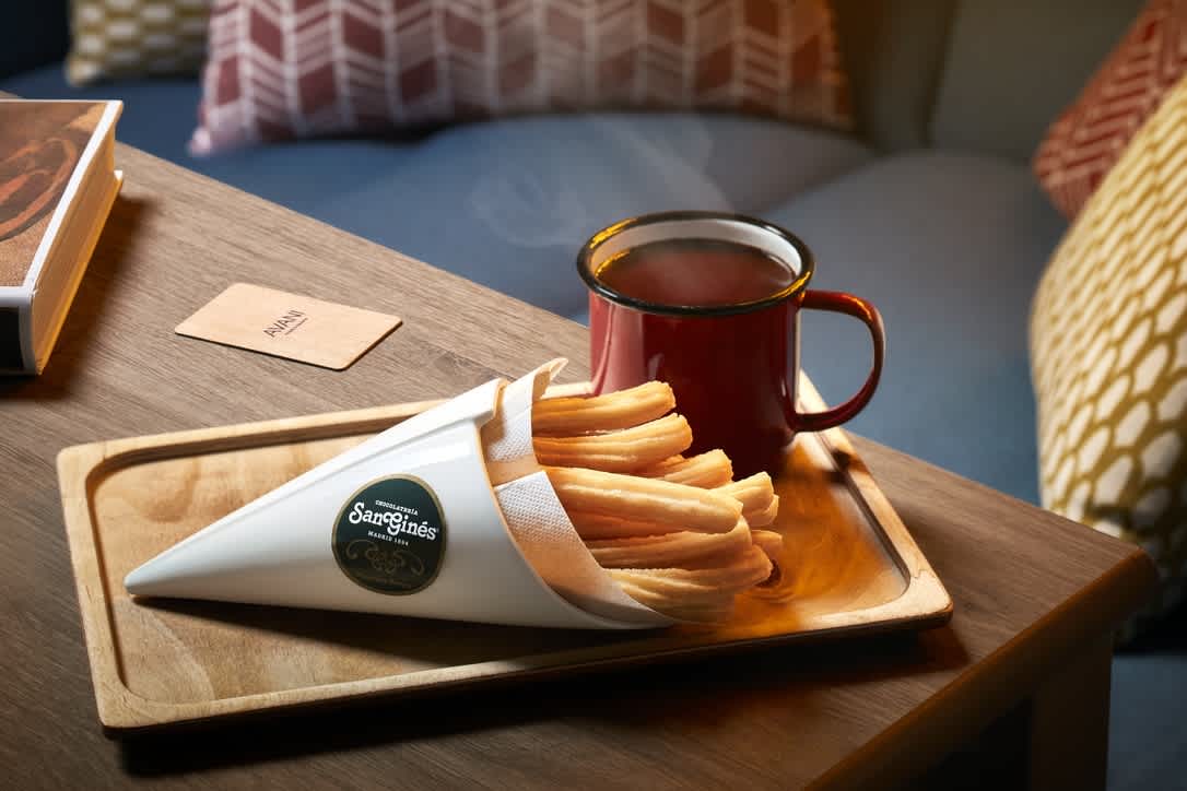 Madrid’s tradition of warm chocolate and churros at The Pantry at Avani sourced from Chocolatería San Ginés