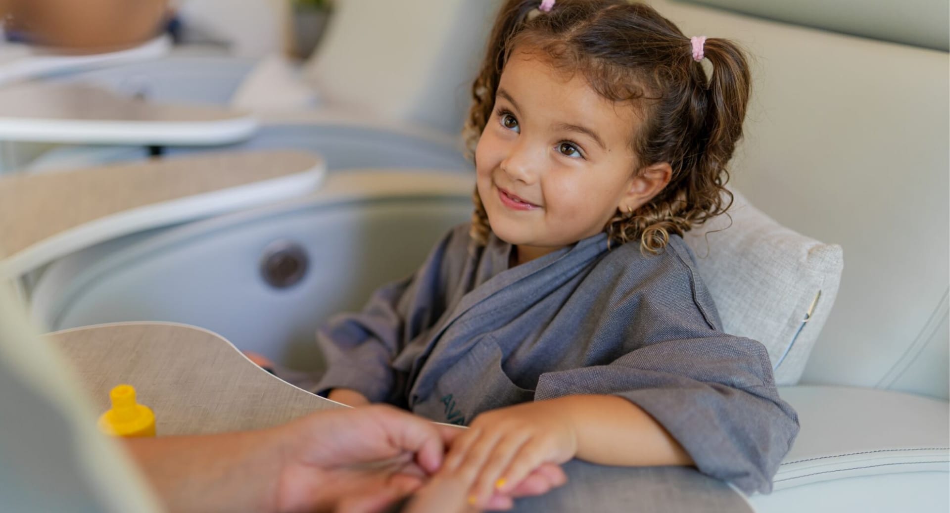 Child enjoying kids’ pedicure treatment at Avani+ Fares Maldives resort spa
