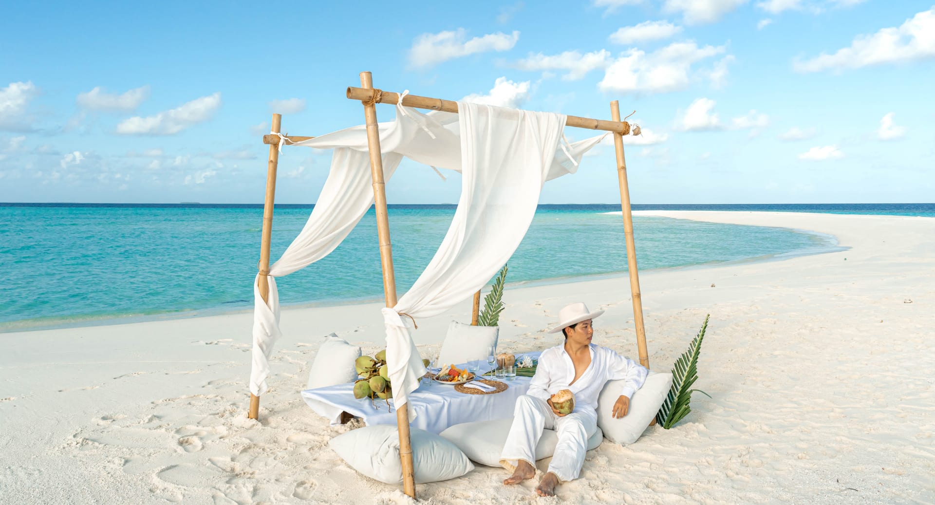 Private beach picnic experience at Avani+ Fares Maldives with ocean views