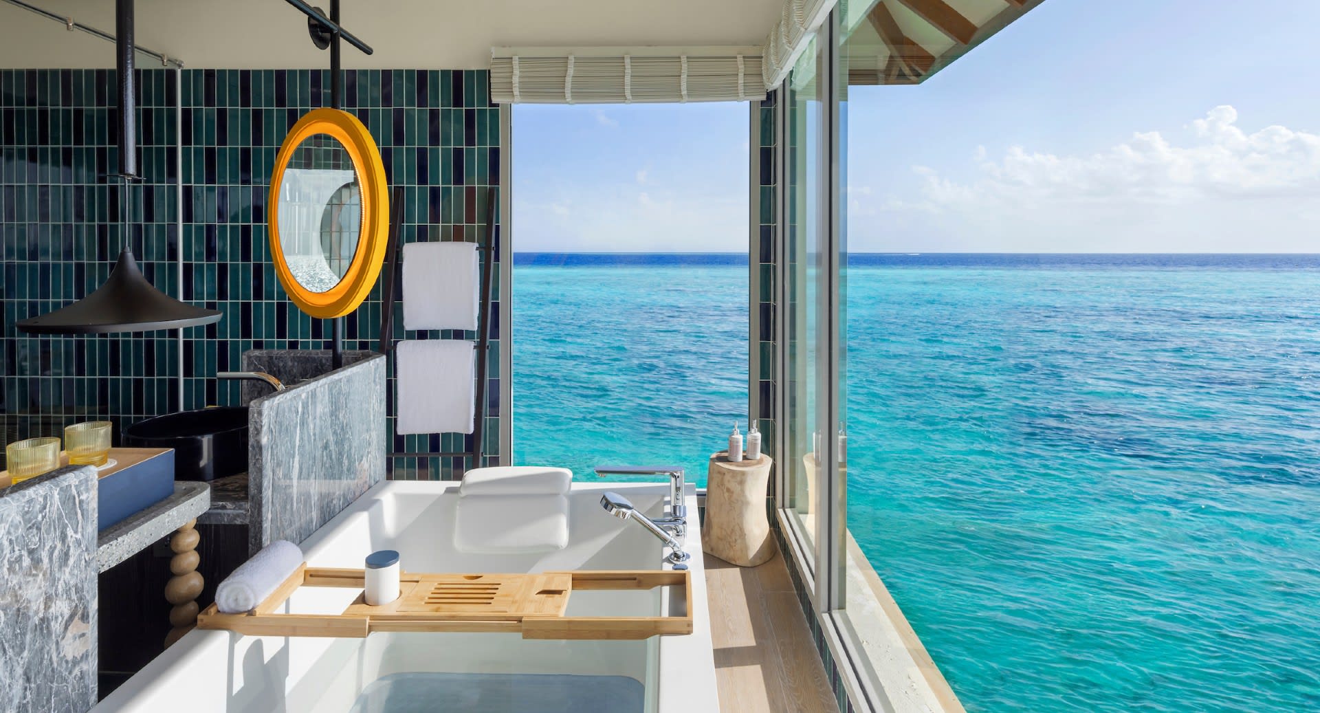 Master Bathroom of Three Bedroom Over Water Pool Residence at Avani+ Fares Maldives Resort