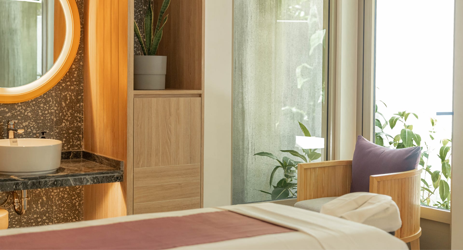 Relaxing treatment room with natural light at Avani+ Fares Maldives