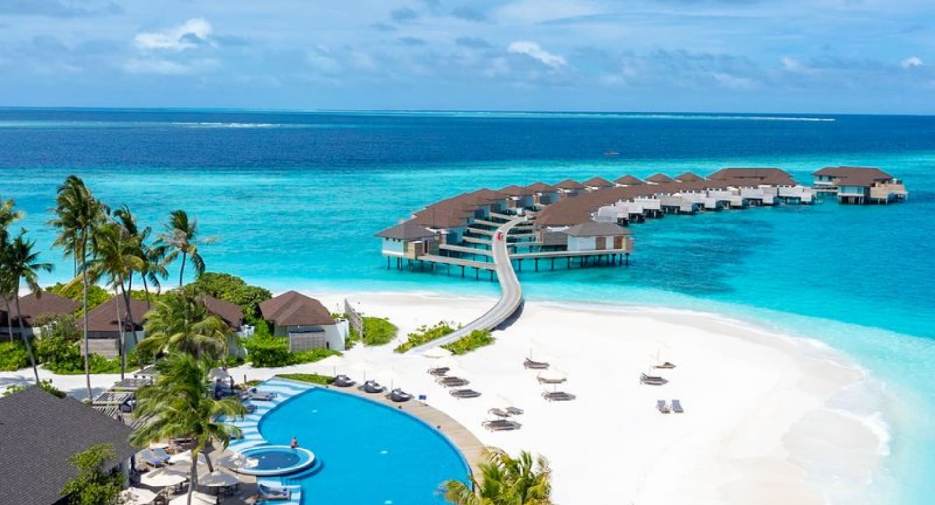 Luxury beachfront and overwater accommodation at Avani+ Fares Maldives island resort