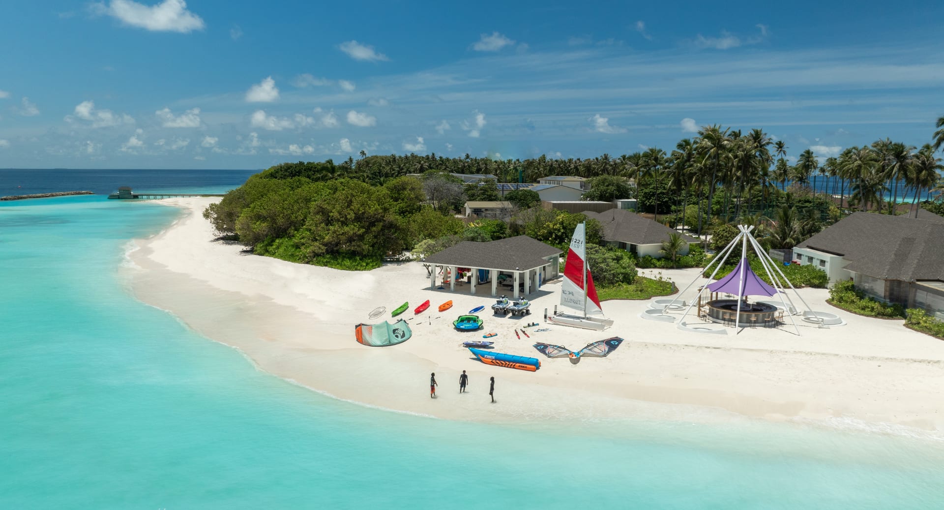 Beachfront water sports center offering kayaking, paddleboarding, and sailing at Avani+ Fares Maldives