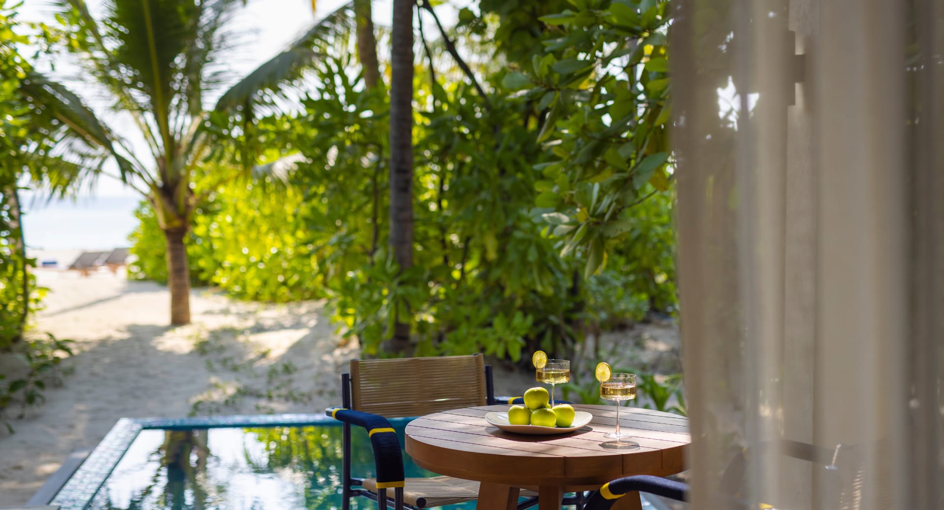 Beach Pool villa terrace with plunge pool and garden view at Avani+ Fares Maldives resort