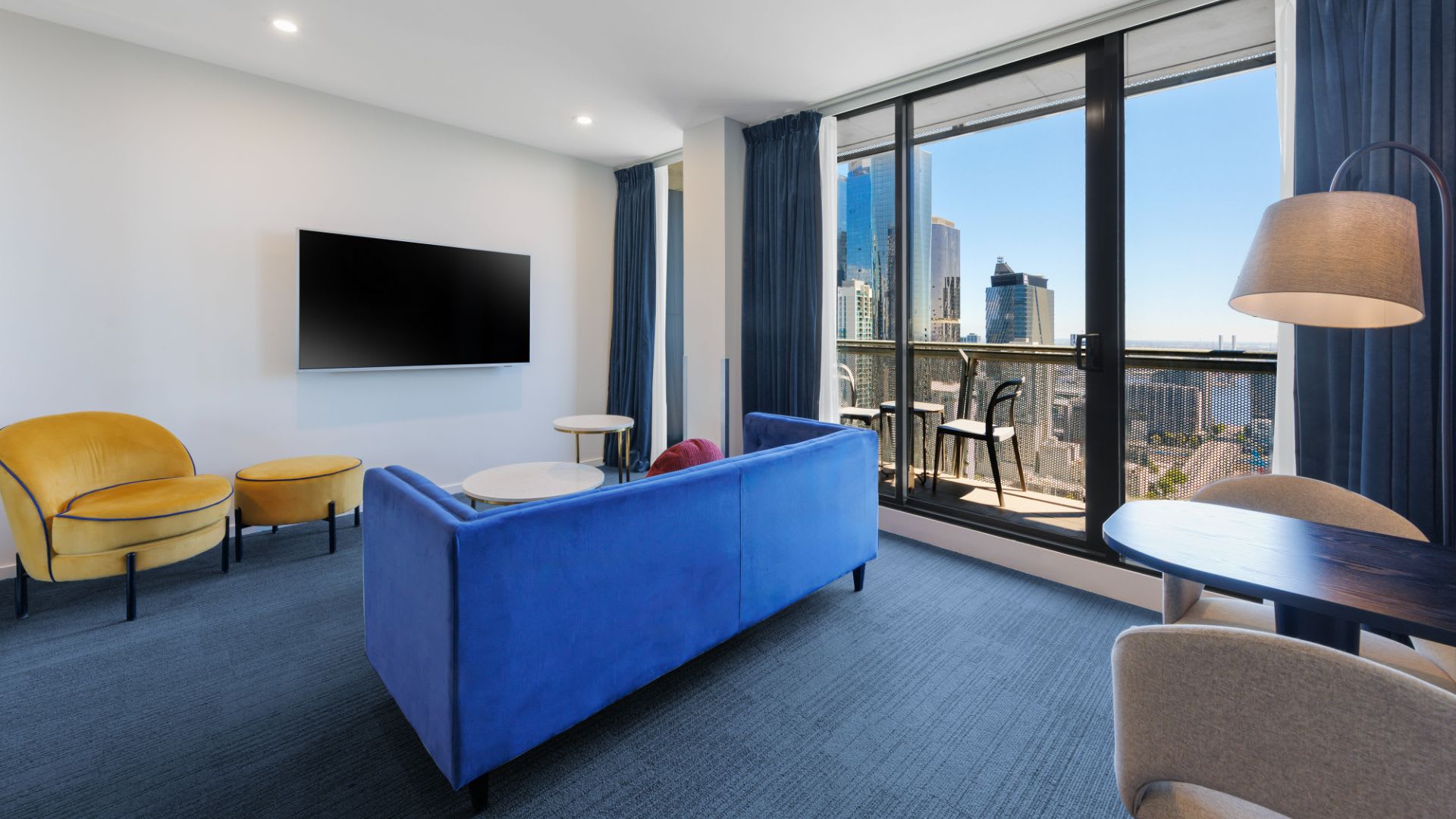 Living area of a One Bedroom Suite at Avani Melbourne Jazz Corner Residences