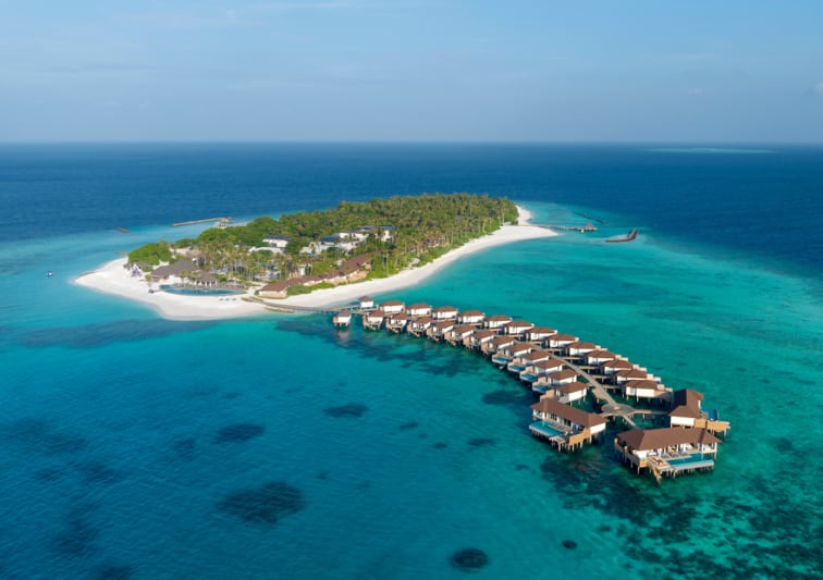 Island aerial view of Avani+ Fares Maldives Resort