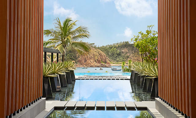 Direct pool and mountain views from Avani Quy Nhon Resort