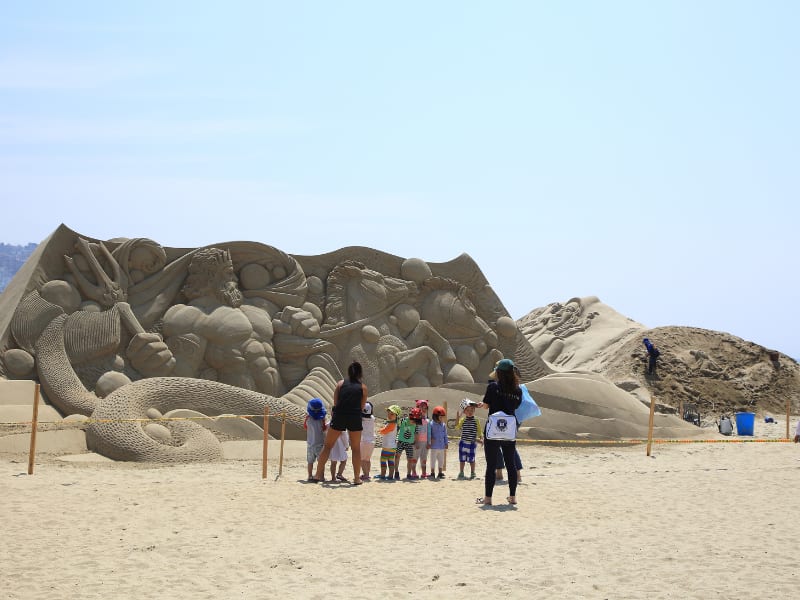 Large sand art at Haeundae Beach during sand festival in Busan