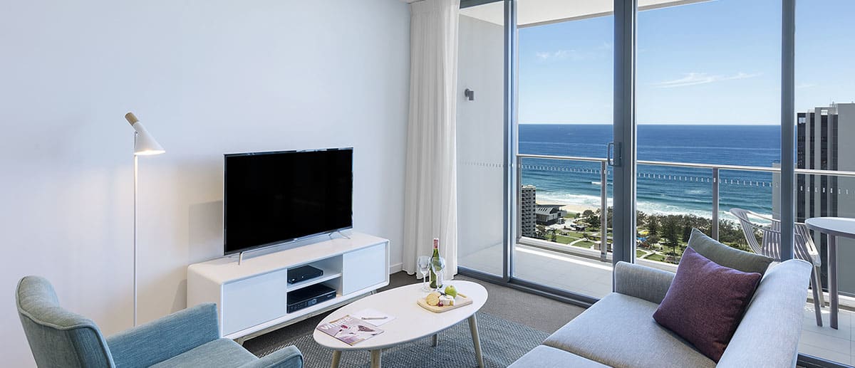 comfortable and spacious living room with grand ocean view at two bedroom ocean suite AVANI Broadbeach Gold Coast Hotels