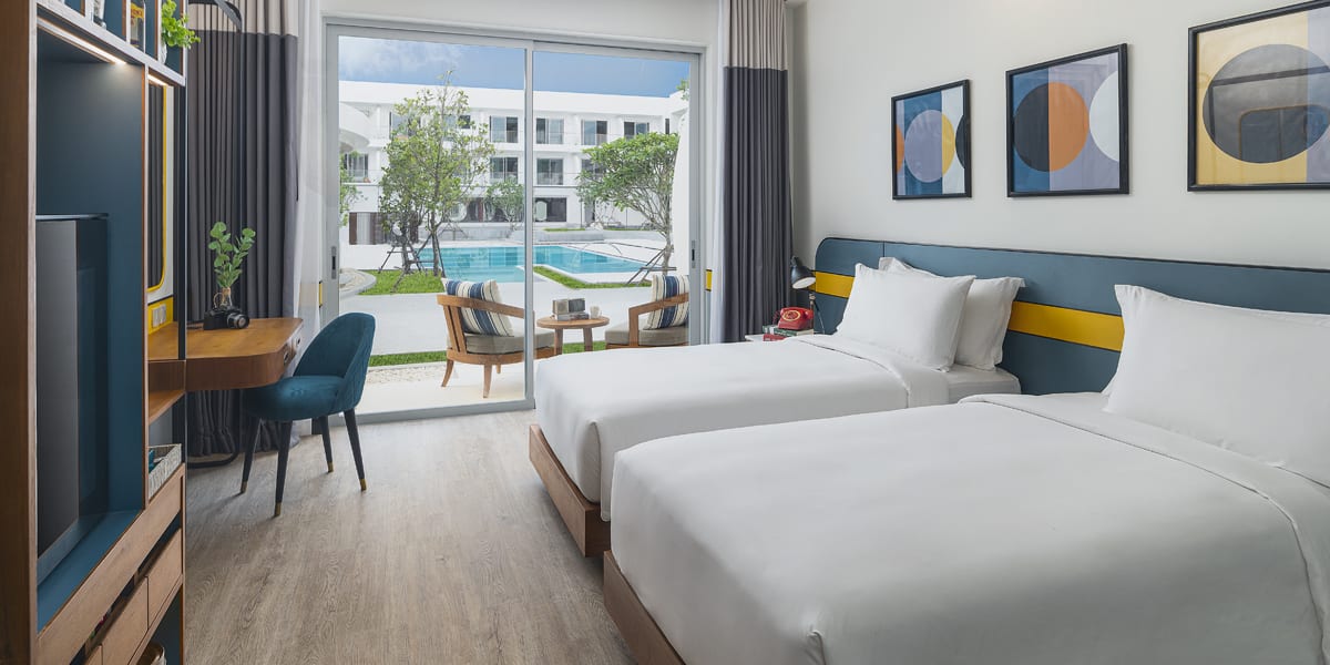 Avani-Chaweng_Funky-Poolside-Room_Twin-Bed_1200x600