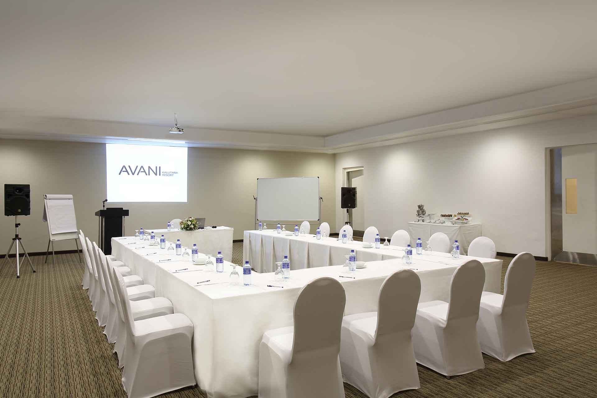 A meeting room with u shape set up