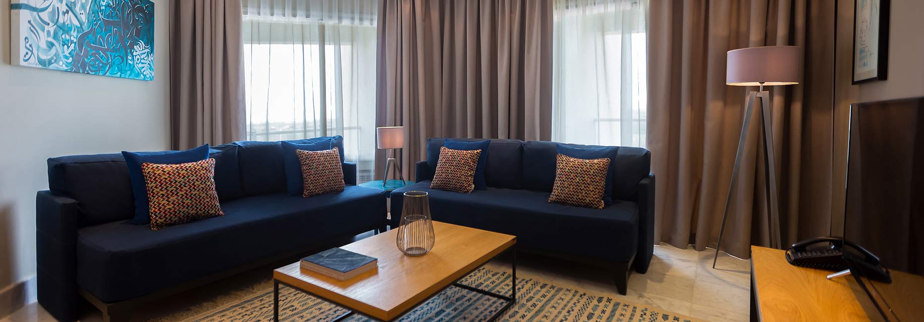 Avani One Bedroom Suite Living Room at Avani Les Berges du Lac Tunis Suites