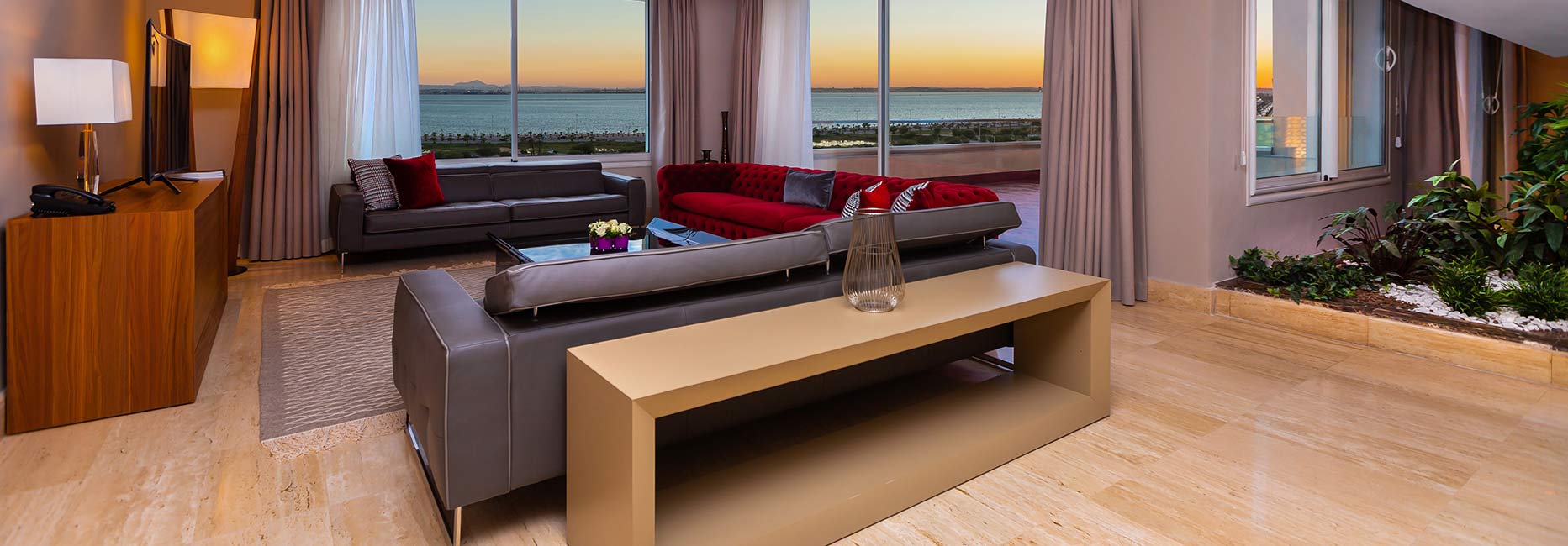 Avani Four Bedroom Lake View Loft Suite Living Room at Avani Les Berges du Lac Tunis Suites