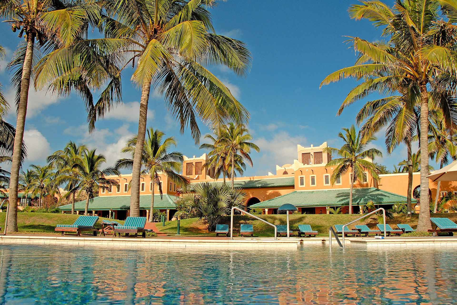 Exterior view of AVANI Pemba beach hotel from the pool
