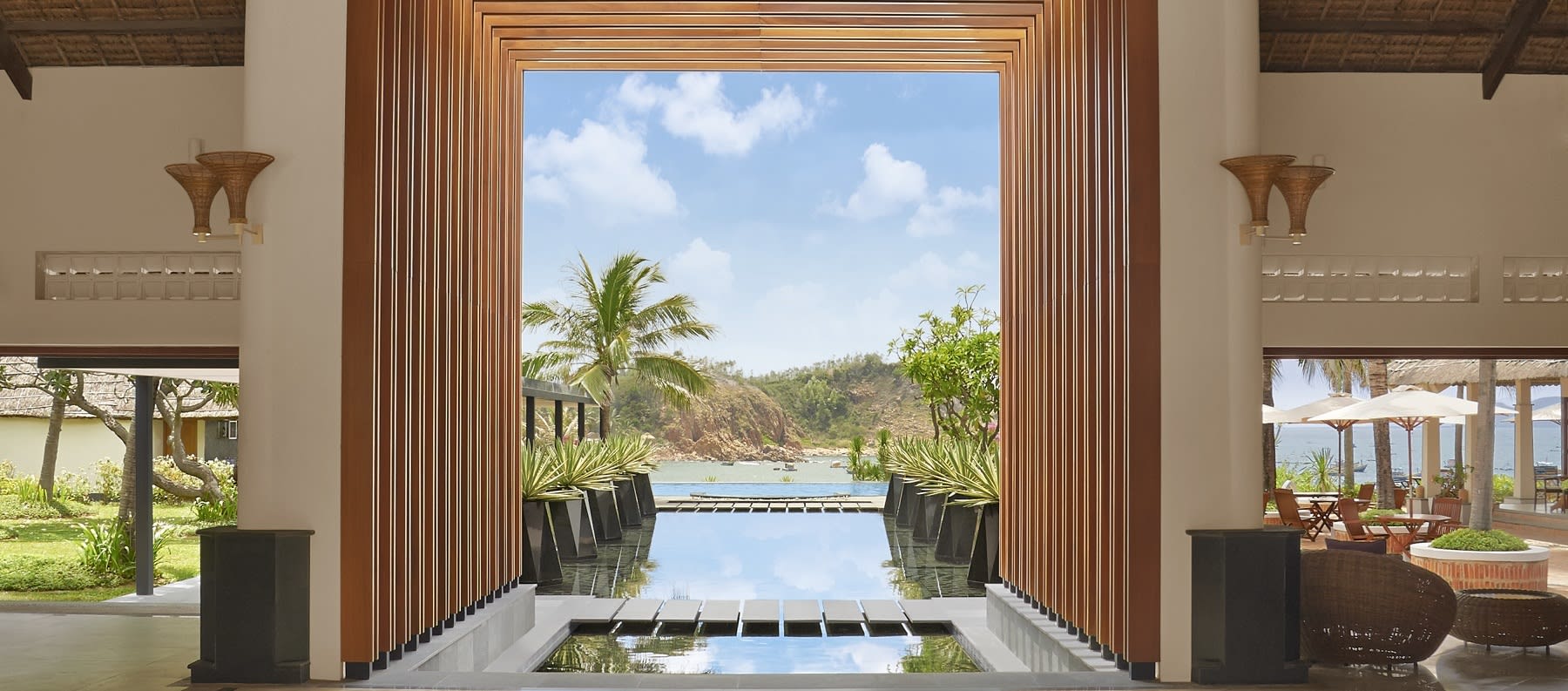 Avani Quy Nhon Resort lobby view with infinity water feature