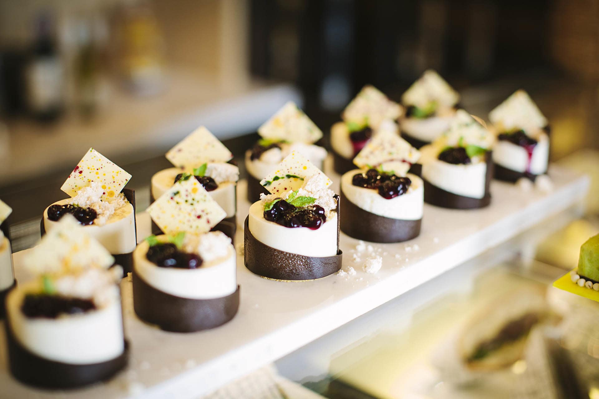 A dish of sweets at pantry by AVANI